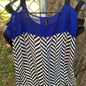 Royal, black and white strappy sleeve blouse.